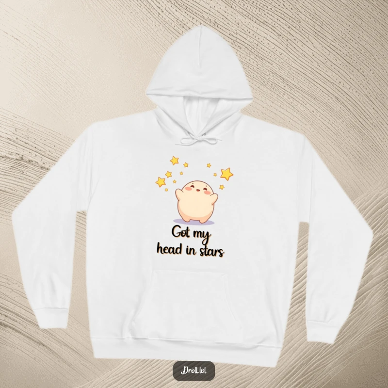 Funny hoodie with a cheerful blob character trying to grab falling stars, perfect for cozy nights.
