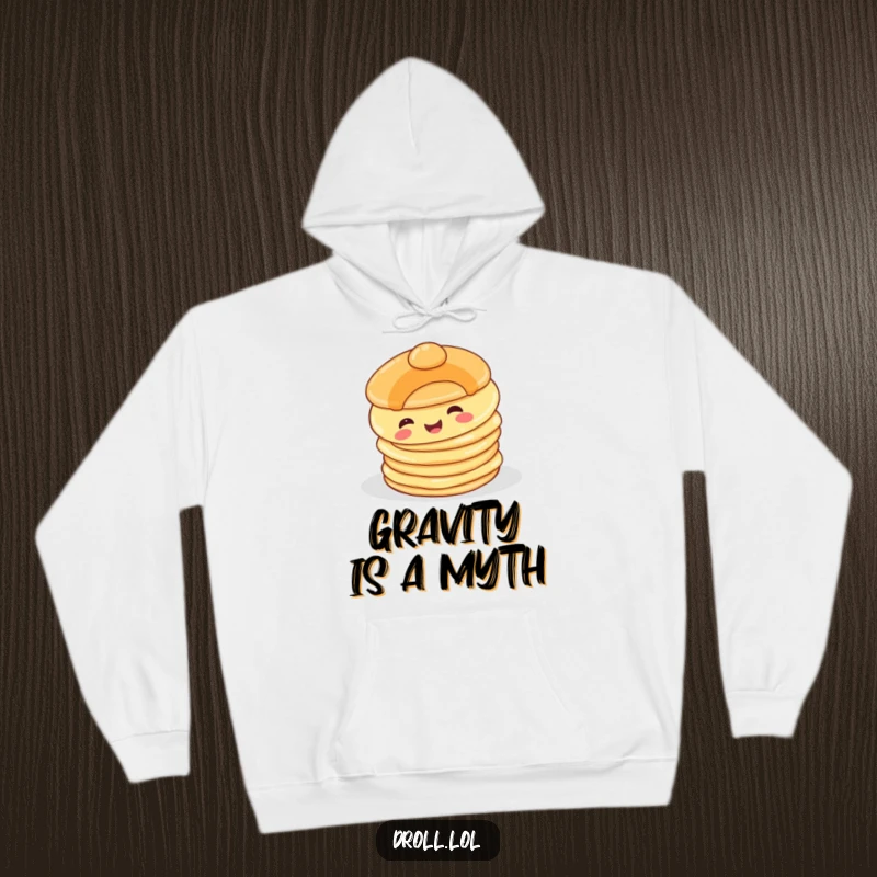 Funny Happy Pancake Hoodie: A smiling pancake character comically falling off a stack, offering comfort and funny breakfast vibes.