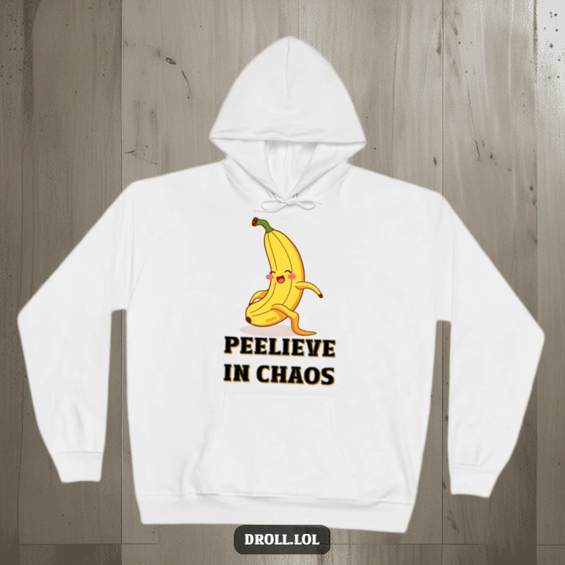 Funny hoodie with a giggling banana in mid-slip on a banana peel, exhibiting exaggerated posture and a startled look for maximum humor.