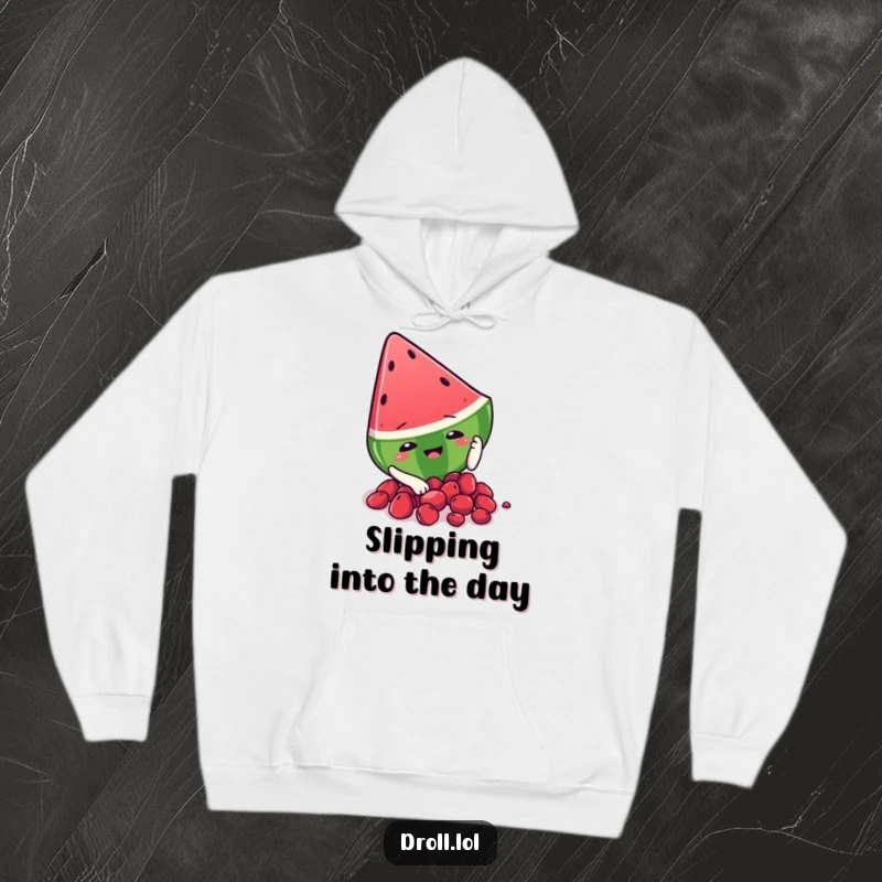 Funny watermelon slice character slipping on seeds, featured on a cozy hoodie for humorous and warm seasonal comfort.