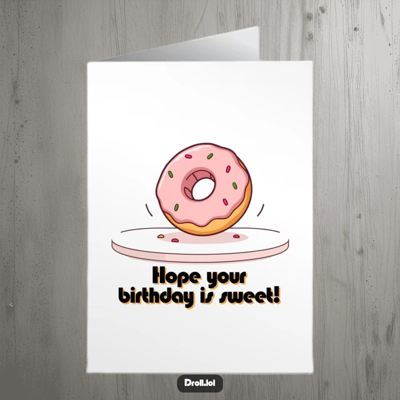 Funny Free Printable Birthday Card: A wobbly donut comically rolling off a table in slow motion.